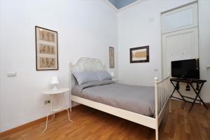 Postel nebo postele na pokoji v ubytování Trevi Suite B&B