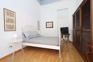 TV a/nebo společenská místnost v ubytování Trevi Suite B&B