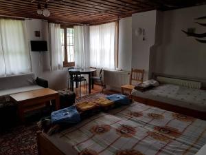 A bed or beds in a room at Borimechkova Kashta