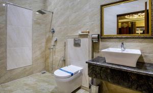 Koupelna v ubytování Hotel ARJUNAA