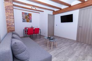 Televízia a/alebo spoločenská miestnosť v ubytovaní apartamento las torres-botanico con 2 habitaciones