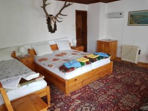 A bed or beds in a room at Borimechkova Kashta