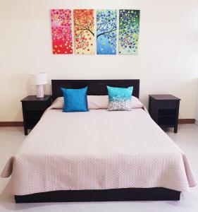 A bed or beds in a room at MS Residence Building