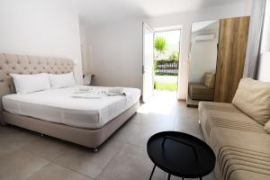 Säng eller sängar i ett rum på Kalamaki Zakynthos Apartments