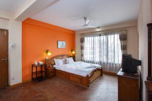 Letto o letti in una camera di Pacific Guest House