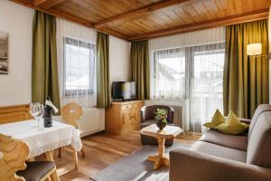 TV a/nebo společenská místnost v ubytování Hotel Haymon