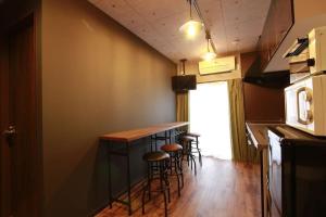 Kuchyň nebo kuchyňský kout v ubytování Shinjuku NY House 1 + 21 fotografií