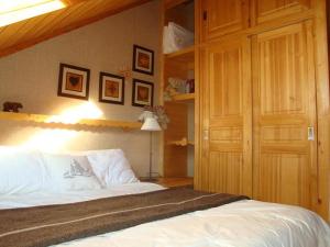 Ένα ή περισσότερα κρεβάτια σε δωμάτιο στο haut de chalet 6 P villard de lans