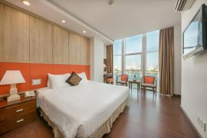 Voodi või voodid majutusasutuse Sun River Hotel toas