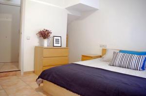 Apartament en Plaça Nova 2, Palafrugell 객실 침대