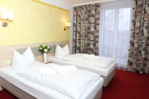 Postel nebo postele na pokoji v ubytování Hotel 3 Linden