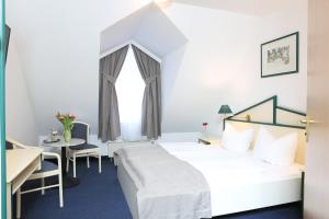 Postel nebo postele na pokoji v ubytování Hotel 3 Linden