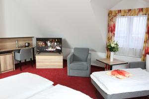 Postel nebo postele na pokoji v ubytování Hotel 3 Linden