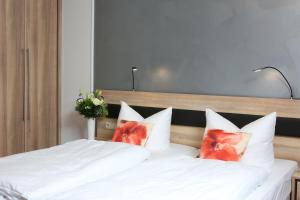 Postel nebo postele na pokoji v ubytování Hotel 3 Linden