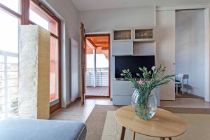 Televízia a/alebo spoločenská miestnosť v ubytovaní Sand - Neptun Park by OneApartments