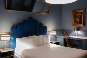 Postel nebo postele na pokoji v ubytování Clerici Boutique Hotel + 22 fotografií