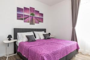 Voodi või voodid majutusasutuse SeaBed Rooms1 Split toas
