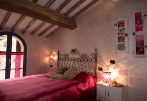 Un pat sau paturi într-o cameră la La Casina di Cioccolata