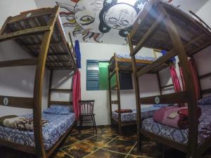 Postel nebo postele na pokoji v ubytování Sumé Hostel