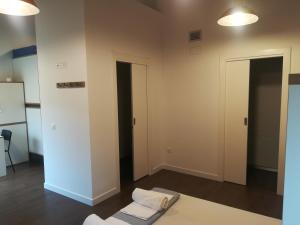 A bed or beds in a room at Agora Hostel