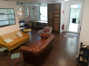 A seating area at Agora Hostel