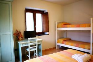 A bed or beds in a room at Il Raduno