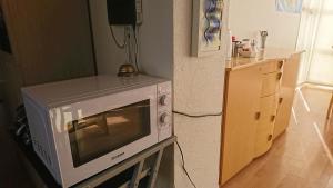 Kuchyň nebo kuchyňský kout v ubytování Alba Guesthouse