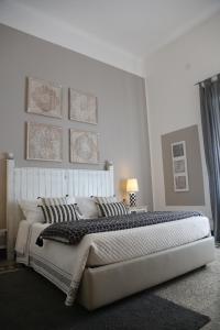 Uma cama ou camas num quarto em Palazzo Bignami