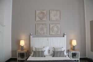 Uma cama ou camas num quarto em Palazzo Bignami