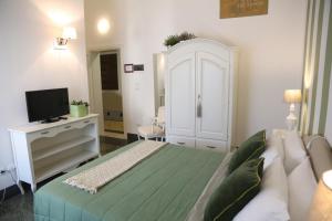 Uma cama ou camas num quarto em Palazzo Bignami