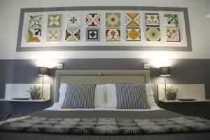 Uma cama ou camas num quarto em Palazzo Bignami