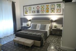 Uma cama ou camas num quarto em Palazzo Bignami
