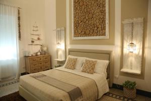Uma cama ou camas num quarto em Palazzo Bignami