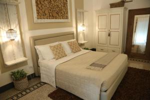 Uma cama ou camas num quarto em Palazzo Bignami