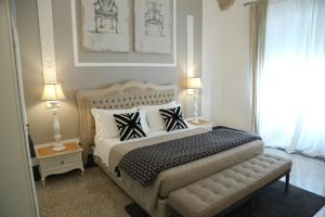 Uma cama ou camas num quarto em Palazzo Bignami
