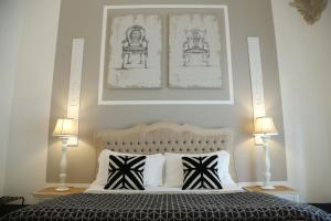 Uma cama ou camas num quarto em Palazzo Bignami