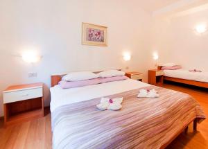 Кровать или кровати в номере Apartment Villa Lidija