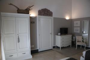 Uma televisão e/ou sistema de entretenimento em Palazzo Bignami