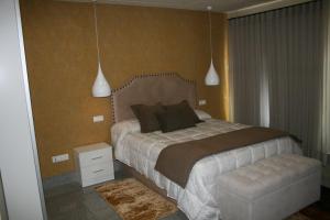 Postel nebo postele na pokoji v ubytování Apartamento "CAMPO CARMEN"