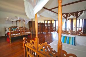 Postel nebo postele na pokoji v ubytování Villa Paradise on the Ocean + 34 fotografií