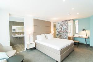 Voodi või voodid majutusasutuse Van der Valk Hotel Hilversum/ De Witte Bergen toas