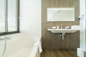 Koupelna v ubytování Van der Valk Hotel Hilversum/ De Witte Bergen