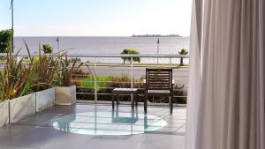 Balkón nebo terasa v ubytování Costa Colonia - Riverside Boutique Hotel