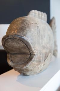 a statue of a fish on a white table at Hôtel Ar Iniz in Saint Malo