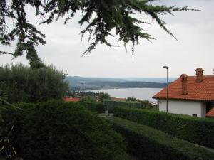 a view of a lake from a house at Apartma Ravbar Portorož in Portorož