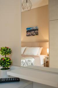 Posteľ alebo postele v izbe v ubytovaní Fix Divine Apartment