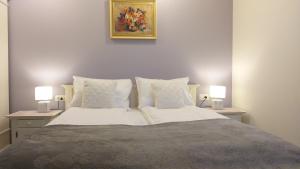 Ένα ή περισσότερα κρεβάτια σε δωμάτιο στο Welcome Apartment