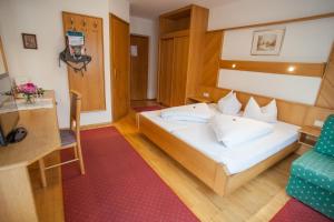 Krevet ili kreveti u jedinici u okviru objekta Hotel Auderer