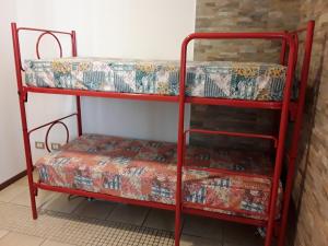 Palanda nebo palandy na pokoji v ubytování G&G1 Appartamento con giardino privato