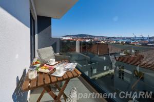 Balkón alebo terasa v ubytovaní Luxury apartment Charm with pool